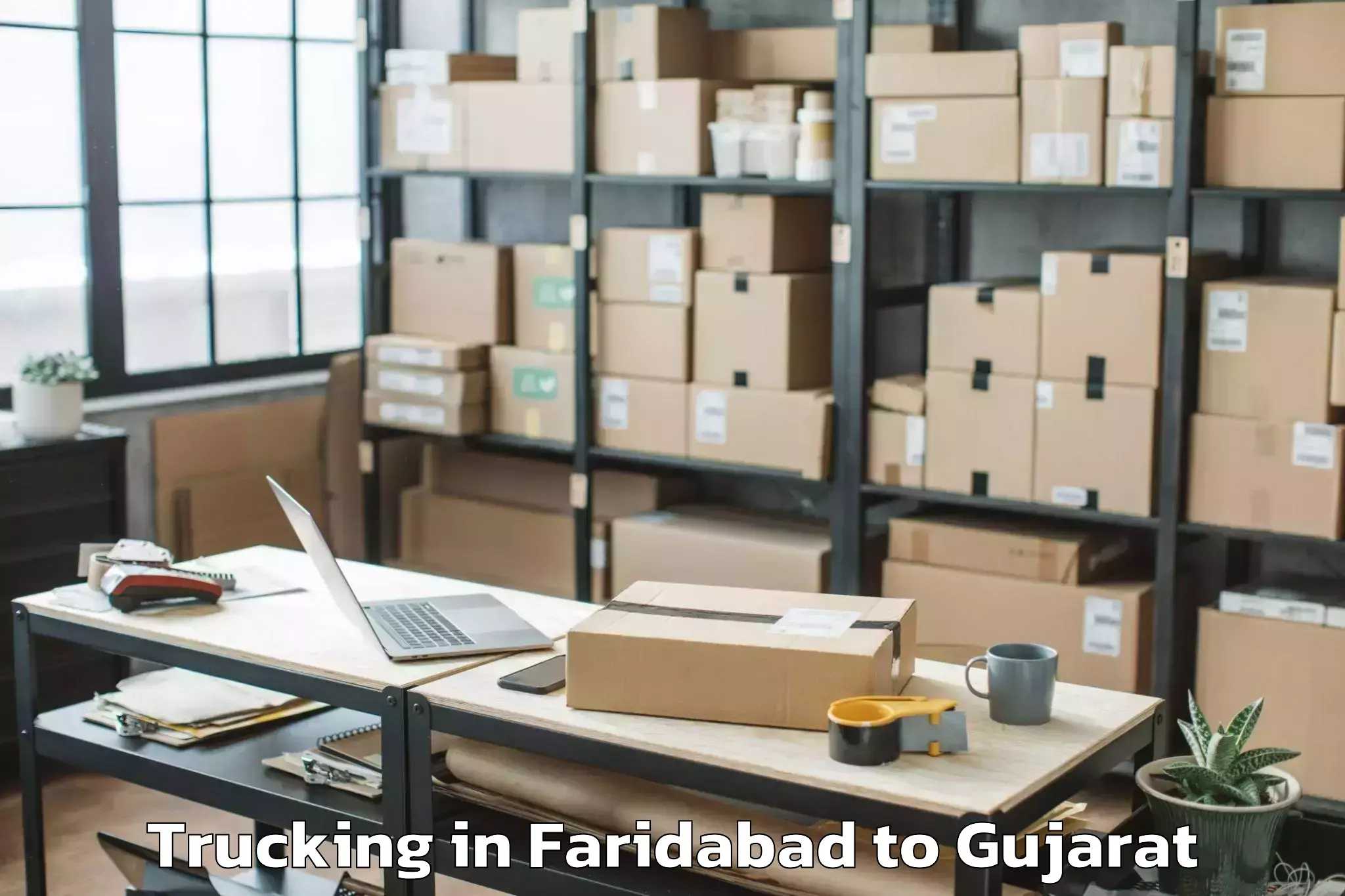 Book Your Faridabad to Karjan Trucking Today